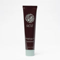 Tube of Roz hair product on a white background