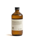 Brown bottle of OWAY moisturizing hair bath on a white background