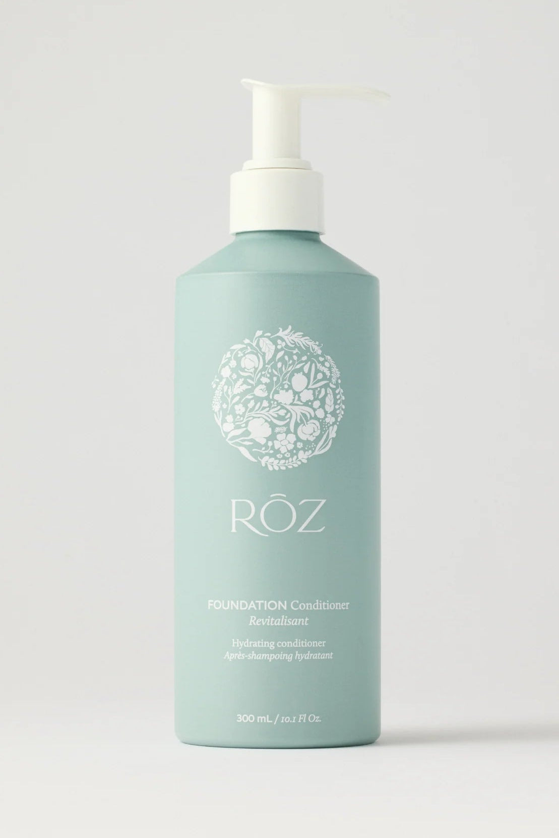 Light blue bottle of Roz foundation conditioner on white back